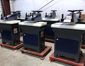 Row of Axis Series swing arm clicker presses on the shop floor