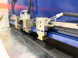 Edge Series pneumatic die clamps on the beam