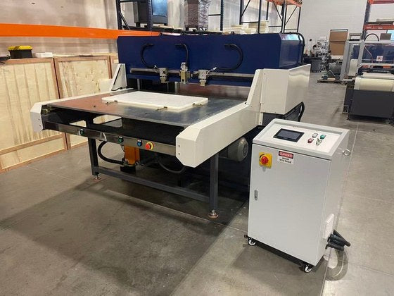 Edge Series full beam press with auto shuttling table and control station