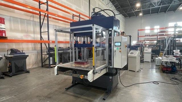 Forge Series four-post press with light curtains and control station